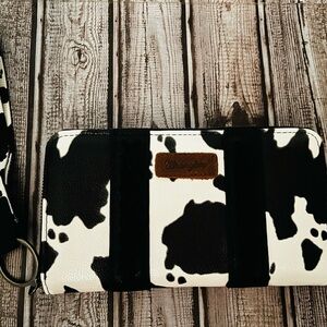 Wrangler Montana West Black and White Cowhide Wristlet Clutch